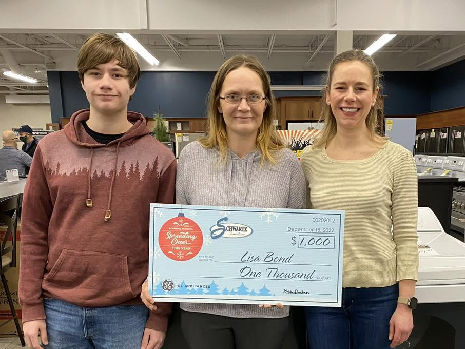 Hometown Hero winner with GE Appliances prize package